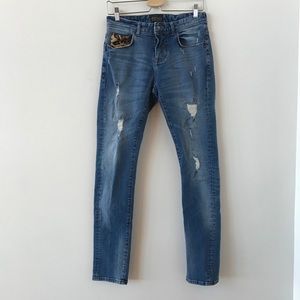 Zara distressed jeans with leopard pocket